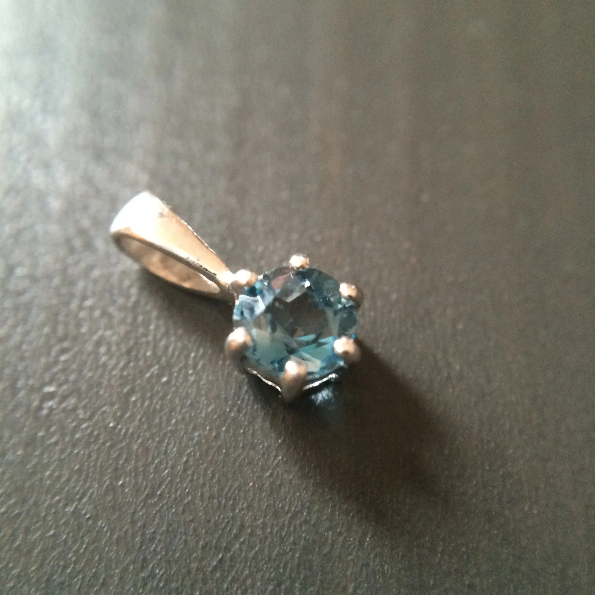 Tiny Blue Topaz Pendant - Prong set
