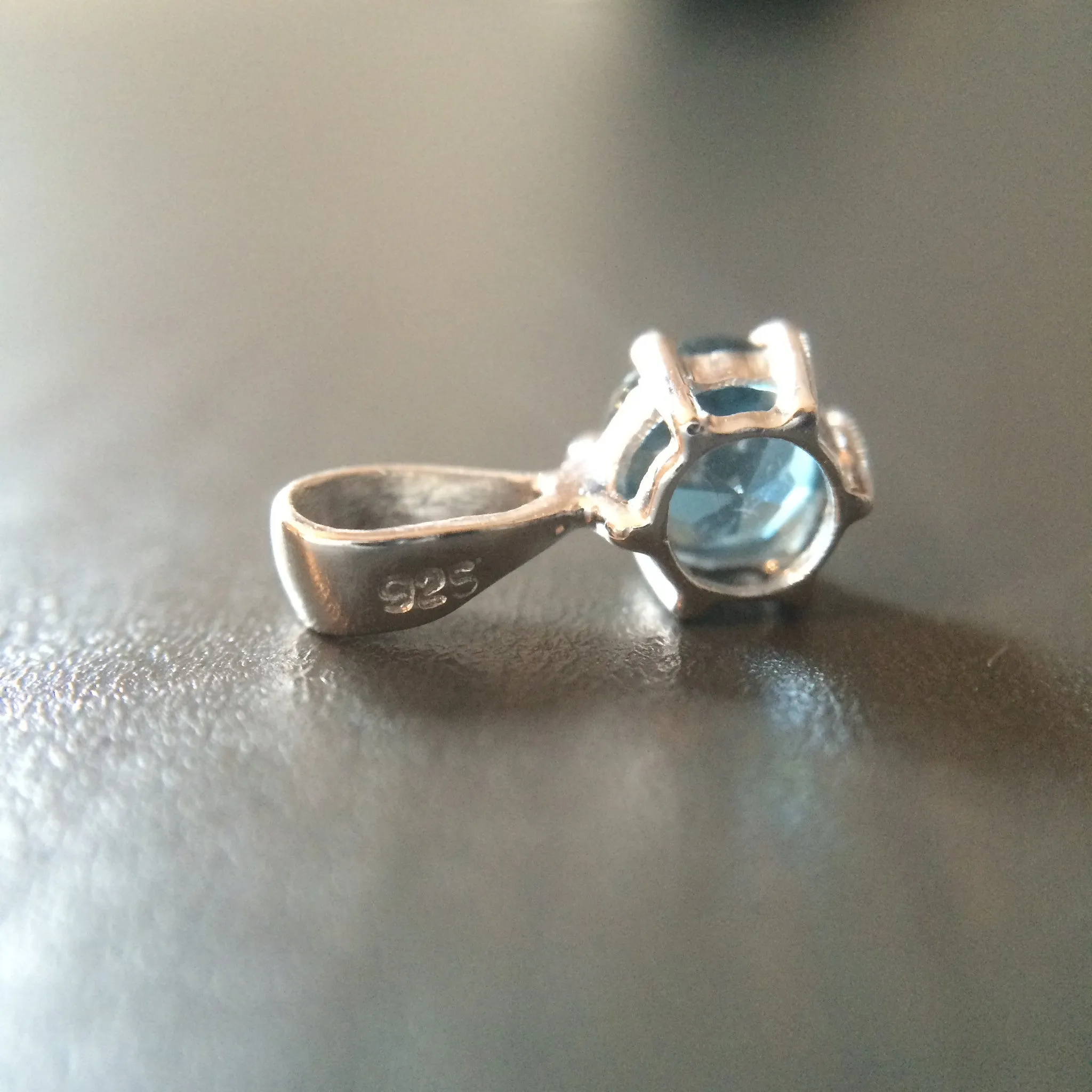 Tiny Blue Topaz Pendant - Prong set