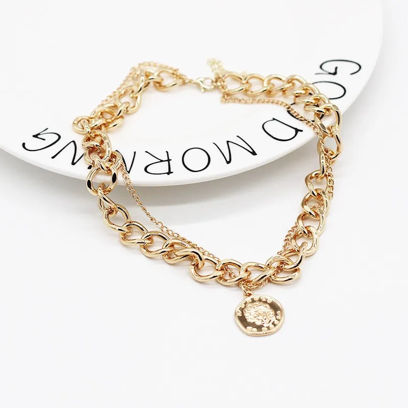 Vintage necklace on neck Gold chain