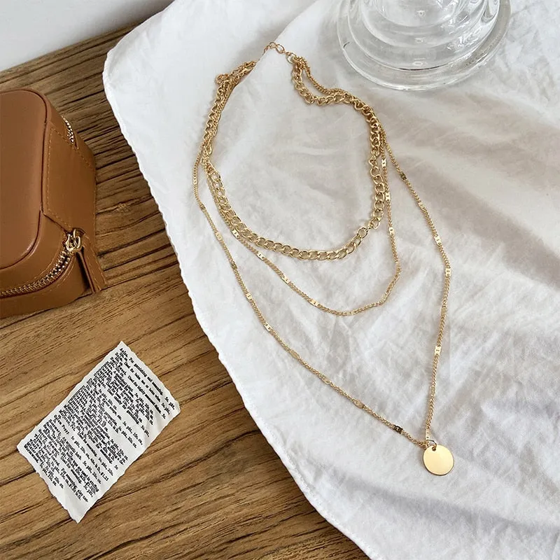 Vintage necklace on neck Gold chain