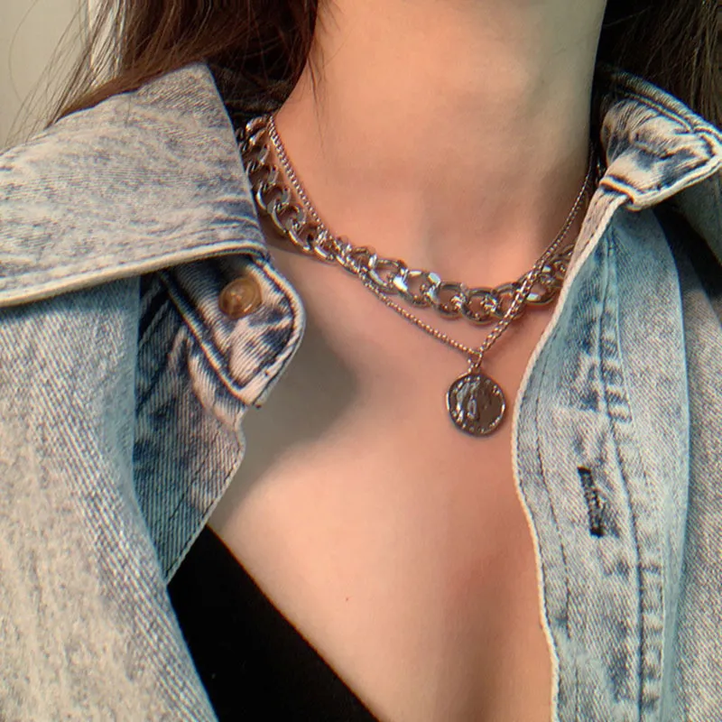 Vintage necklace on neck Gold chain