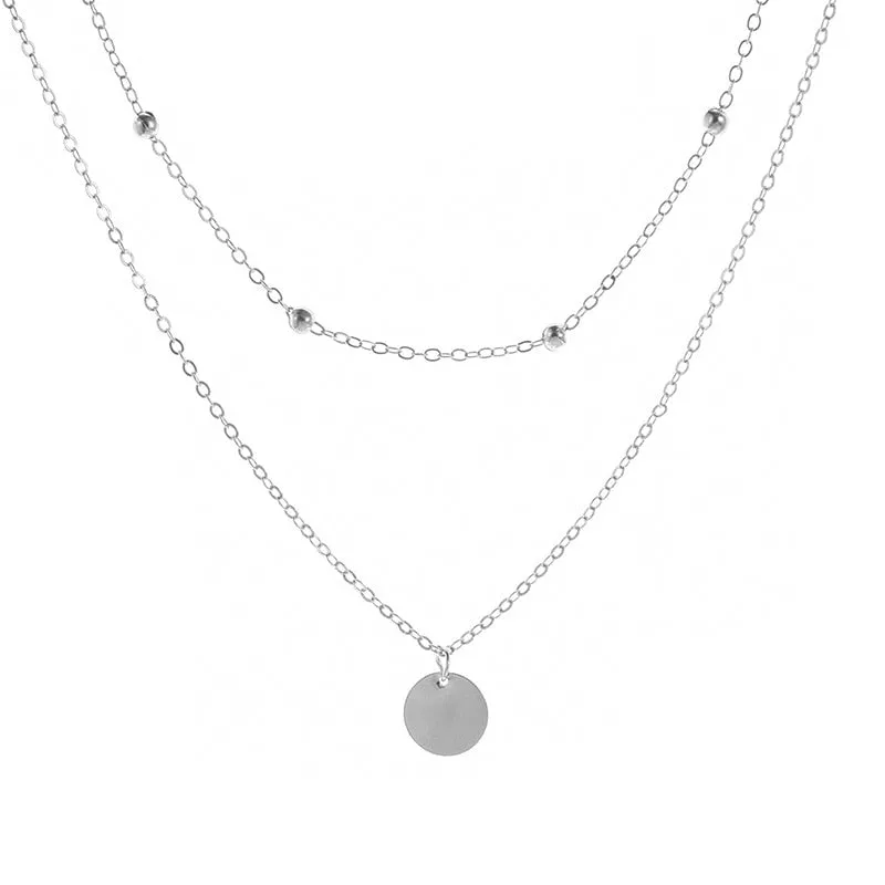 Vintage necklace on neck Gold chain