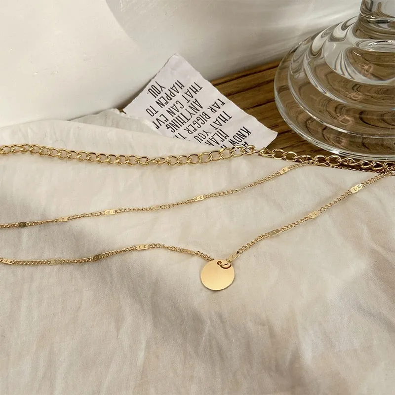 Vintage necklace on neck Gold chain