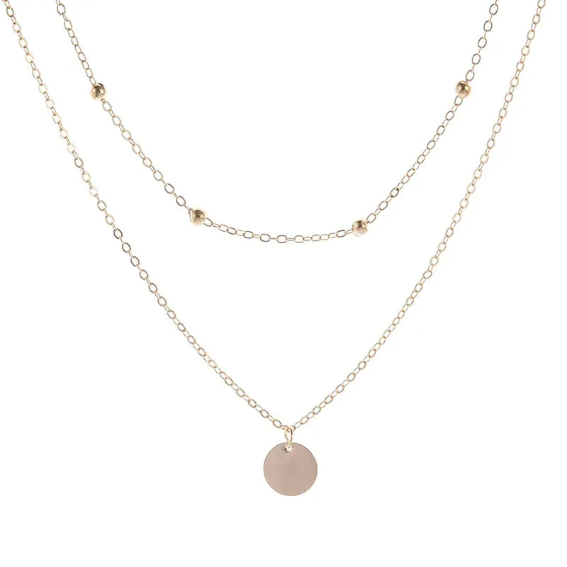 Vintage necklace on neck Gold chain